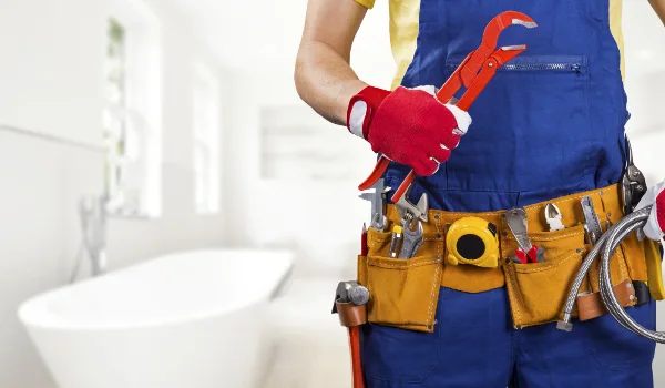 the torso of a plumbing technician showing a tool belt from quality plumbing leander in Irving, TX - Irving TX the torso of a plumbing technician showing a tool belt from quality plumbing leander in Irving, TX - Irving TX